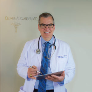 Dr. Alexander holding a clipboard